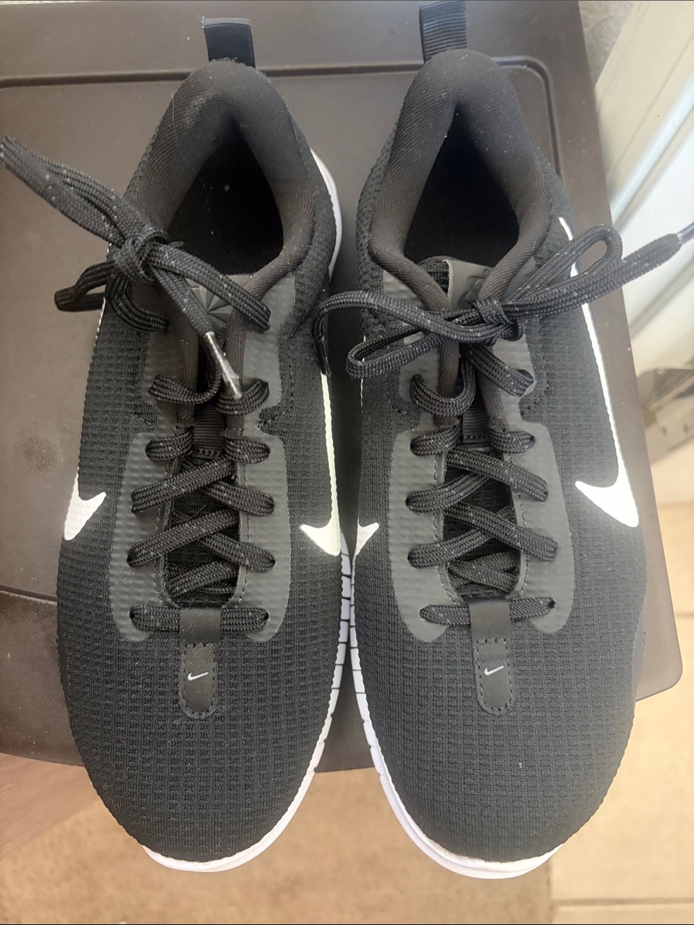 Nike Women’s Black Athletic Sneakers with White Swoosh